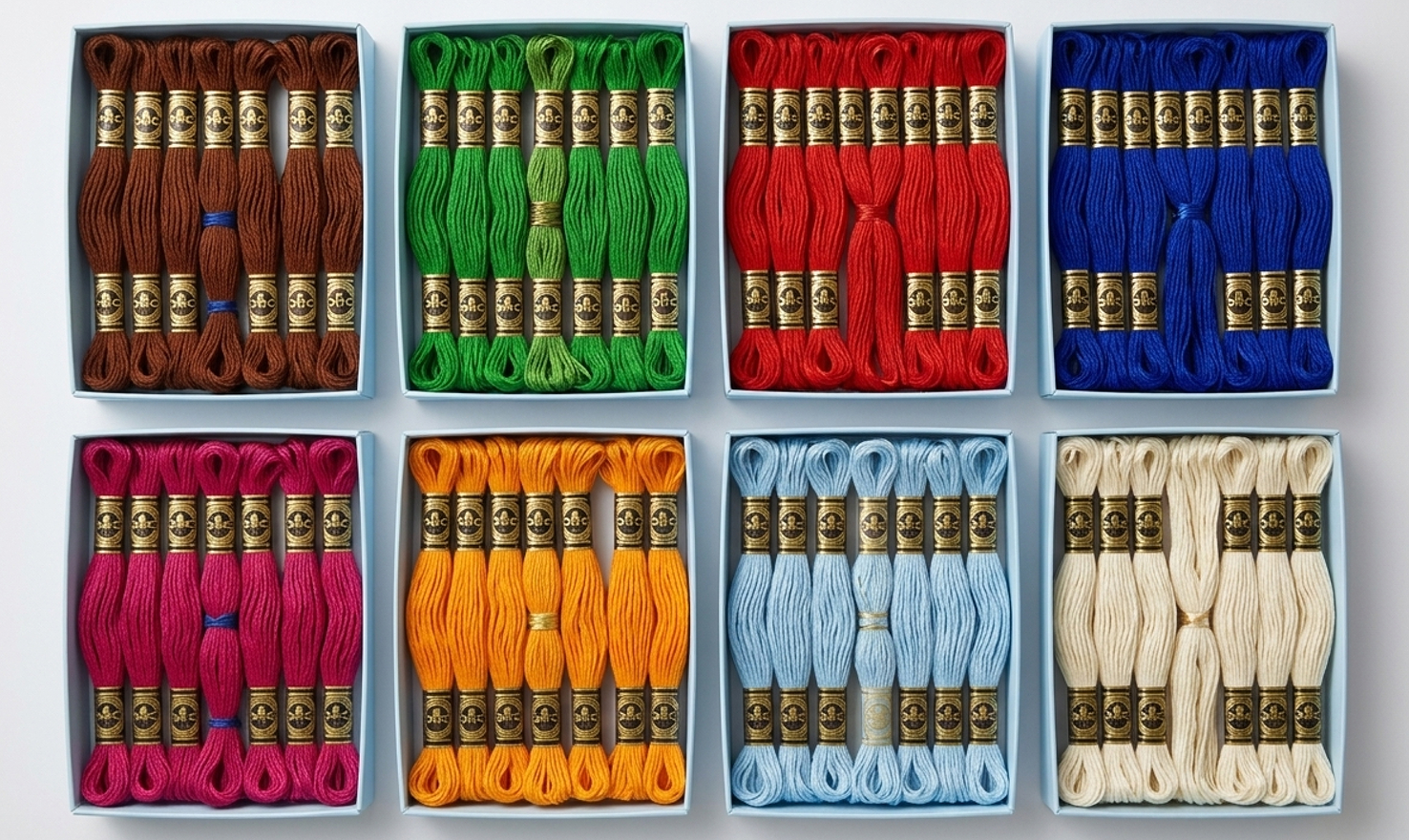 Colourful embroidery thread skeins in boxes